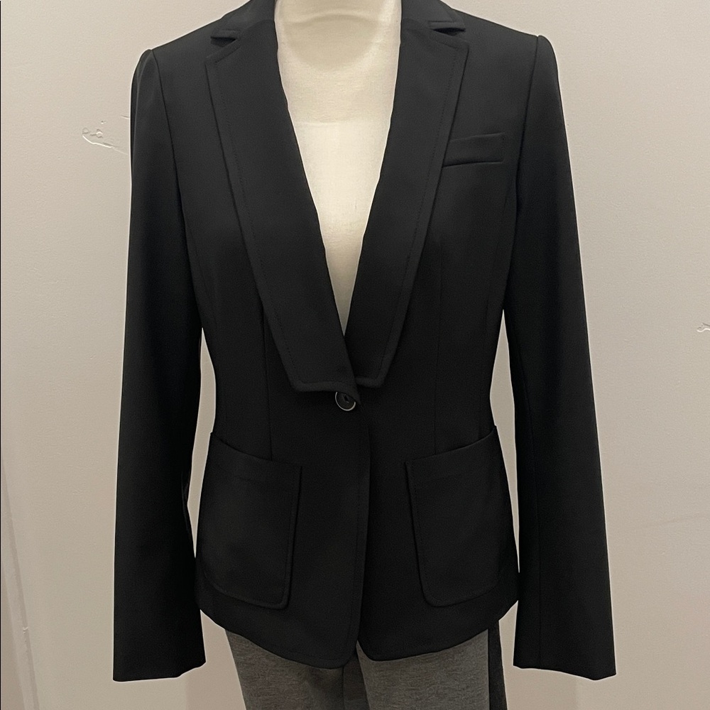W by Worth Black Blazer. One button close, notched collar. Lined w/soft fabric.